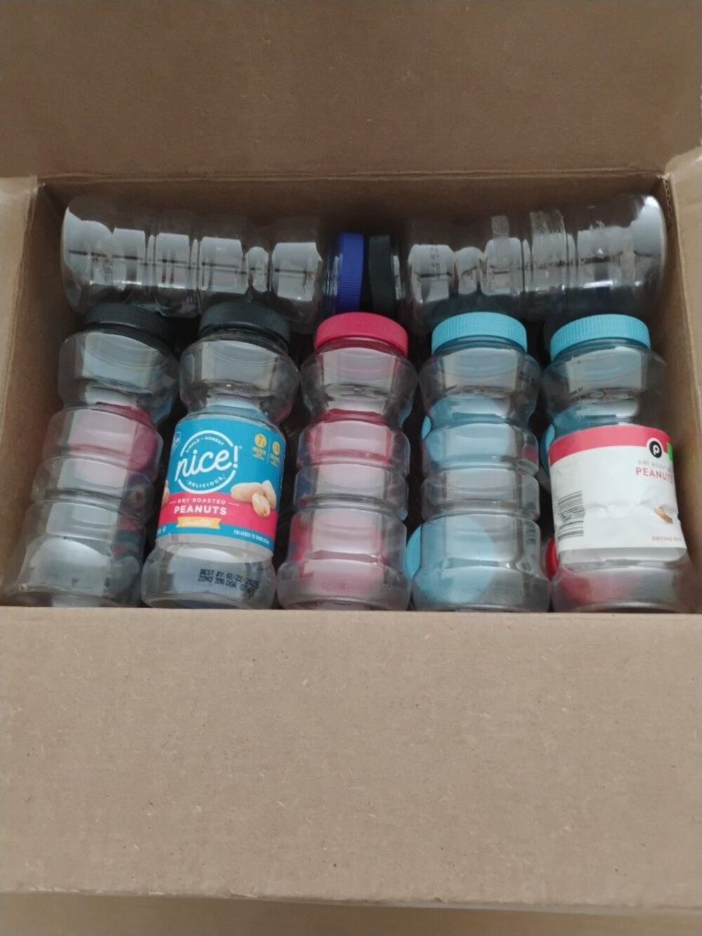 22 empty plastic peanut jars, 16oz size
